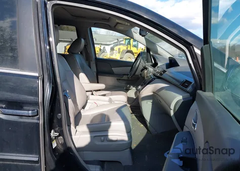 2014 Honda Odyssey Ex-L z USA, uszkodzony, nr VIN 5FNRL5H60EB021136